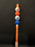 Orange beaded mechanical pencil