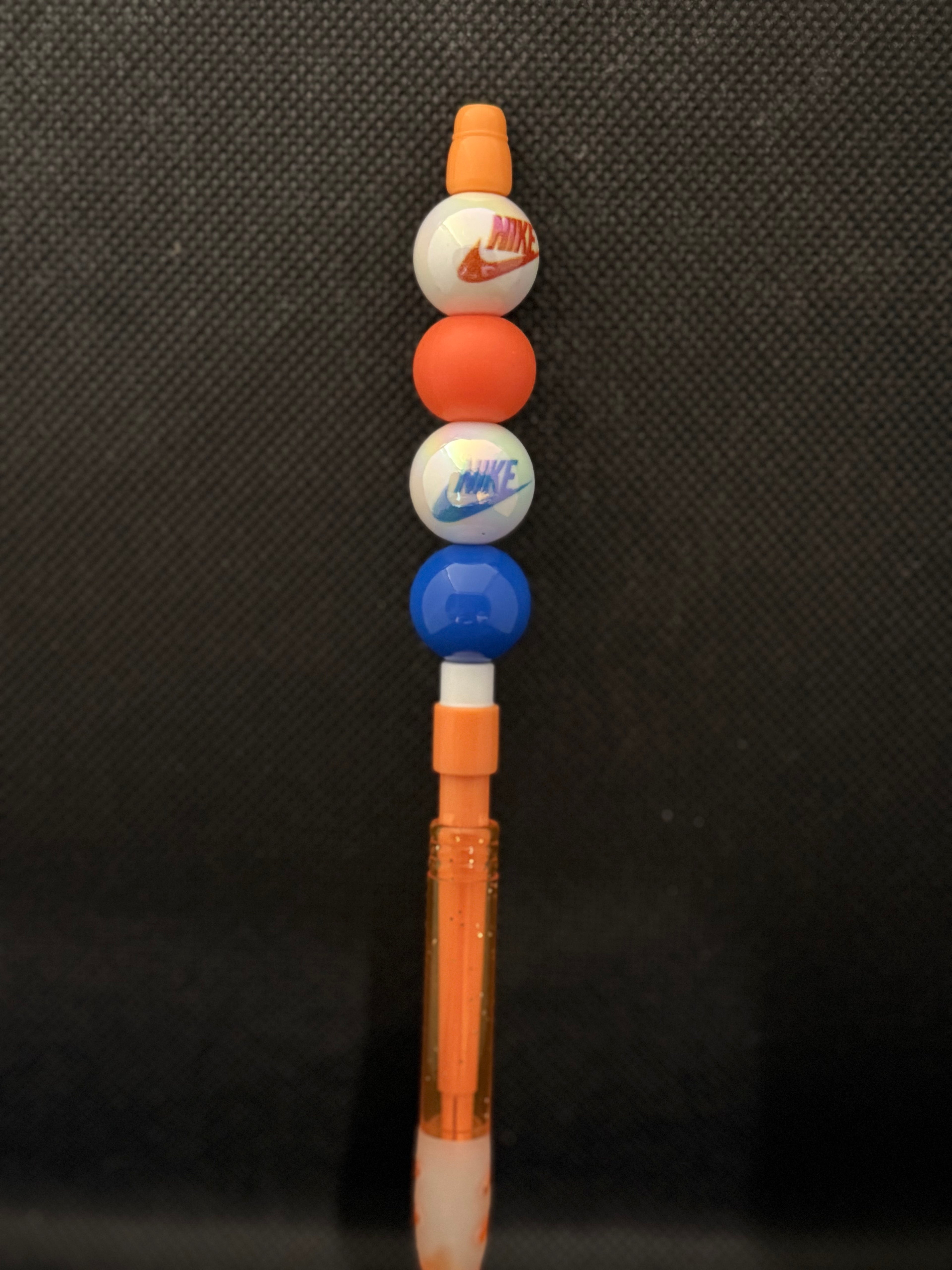 Orange beaded mechanical pencil