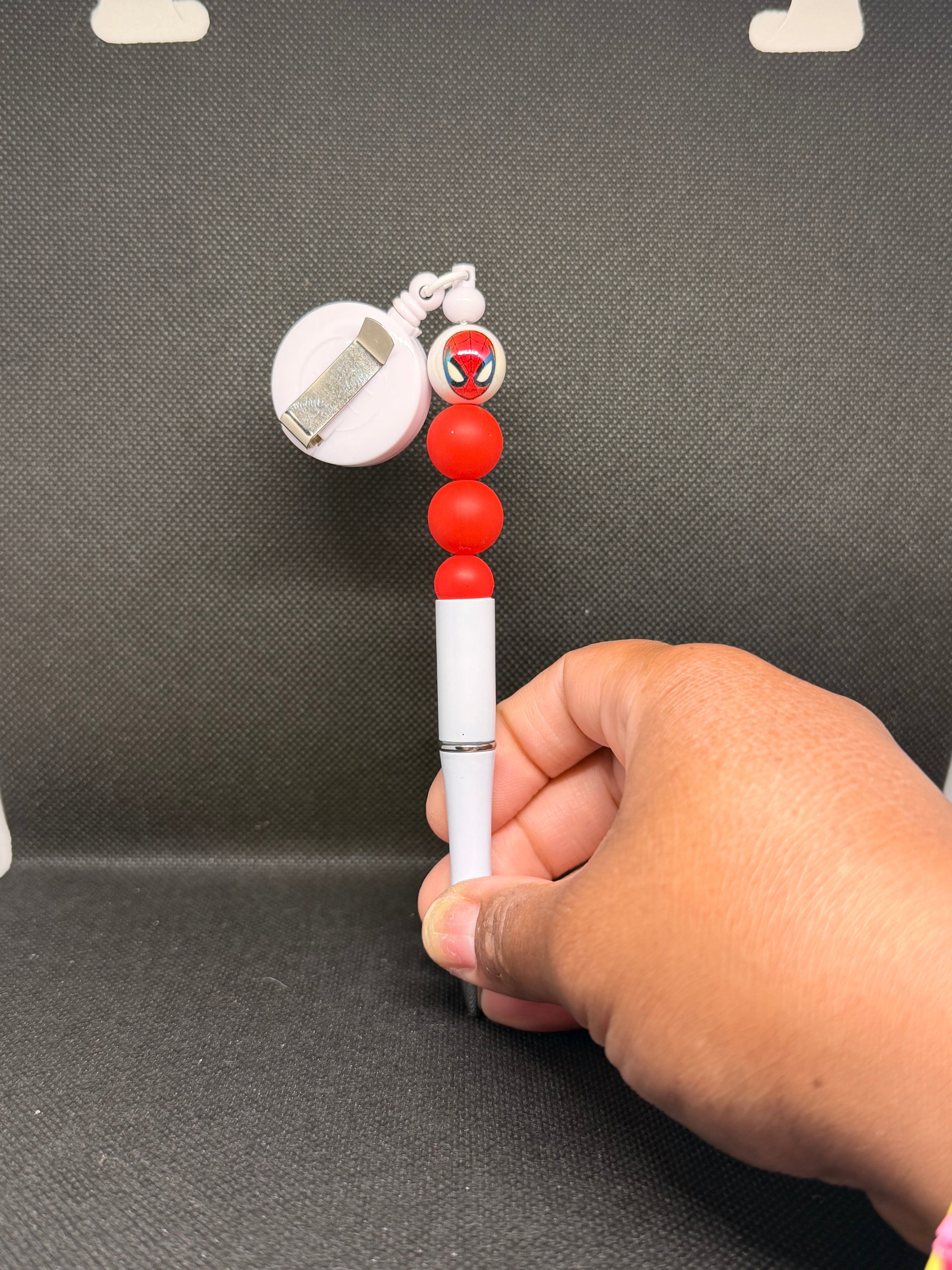 Badge reel pens