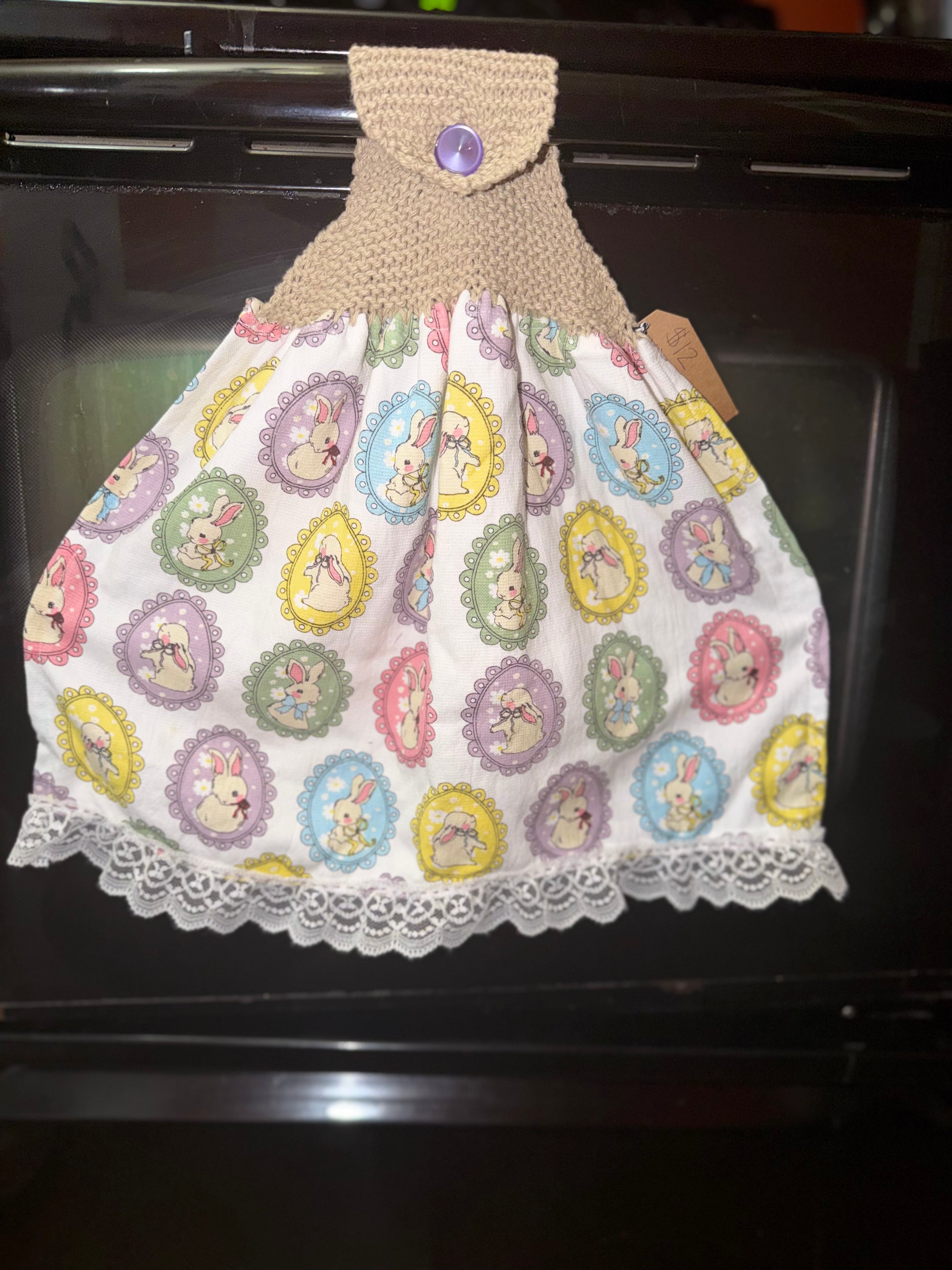 Knit top hanging towel