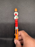Orange multi ink pen